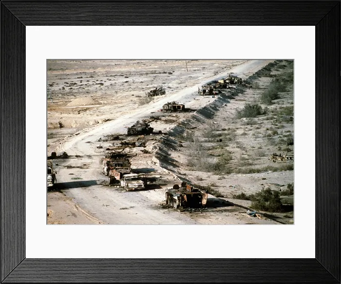 Framed Print : Iraqi armored personnel carriers tanks and trucks destroyed in a Coalition attack along a road in the Euphrates River Valley during Operation Desert Storm Framed Print : Iraqi armored personnel carriers tanks and trucks destroyed in a Coalition attack along a road in the Euphrates River Valley during Operation Desert Storm