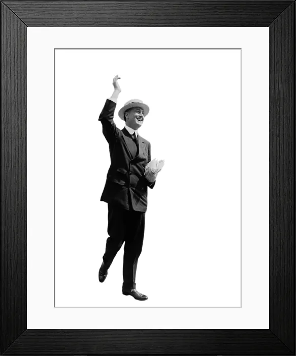 Framed Print : Franklin D. Roosevelt, then Assistant Secretary of the Navy in the Woodrow Wilson Administration. FDR smiles and waves as he walks in Washington, D.C. 1915-1921