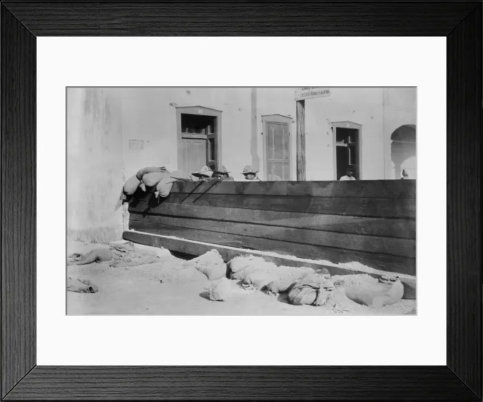 Framed Print : Mexican Revolutionary soldiers behind a captured Federal barricade in Juarez