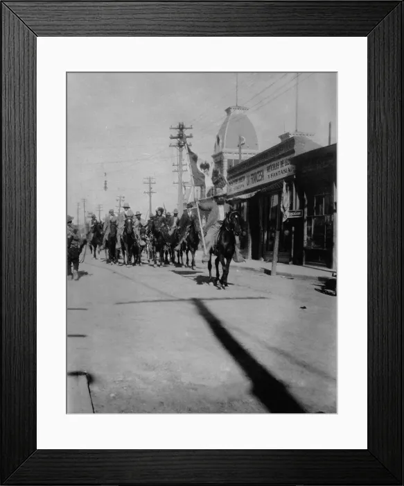 Framed Print : Mexican Revolutionaries entering Juarez, May 1911. General Roque Gonzalez Garza on horseback, carrying flag, into the newly conquered city (BSLOC_2016_13_28.jpg )