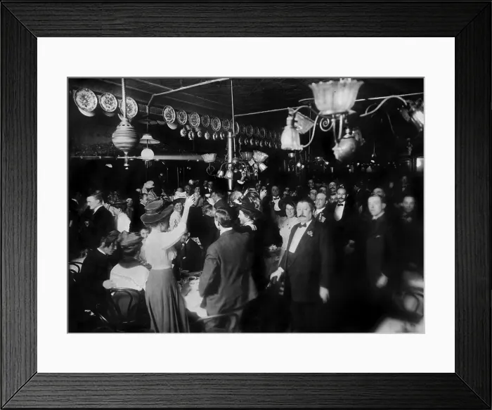 Framed Print : New Years Eve celebration in a New York City restaurant, c. 1910-1915. Men and women eat, drink, and toast to the New Year, c. 1910-1915 (BSLOC_2018_3_79) Framed Print : New Years Eve celebration in a New York City restaurant, c. 1910-1915. Men and women eat, drink, and toast to the New Year, c. 1910-1915 (BSLOC_2018_3_79)