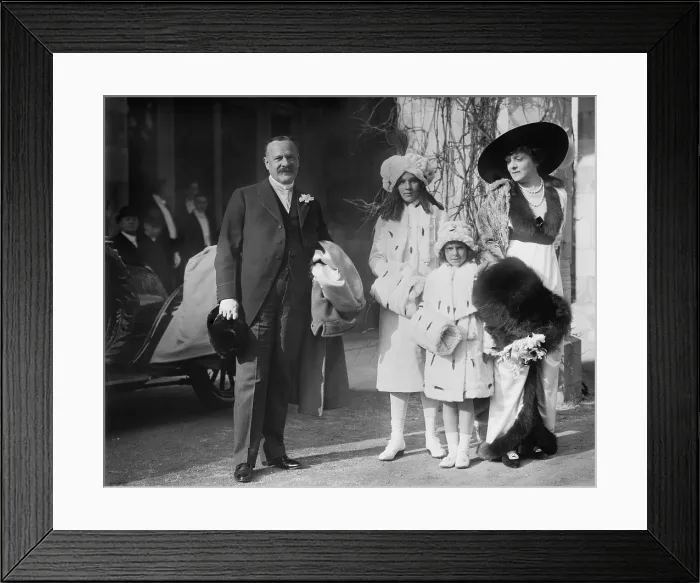 Framed Print : George Jay Gould and family at his sisters wedding in Jan. 1913. L-R: George Jay Gould, Catherine Gould (age 11), Gloria Gould (age 7), and Edith Kingdon Gould Framed Print : George Jay Gould and family at his sisters wedding in Jan. 1913. L-R: George Jay Gould, Catherine Gould (age 11), Gloria Gould (age 7), and Edith Kingdon Gould
