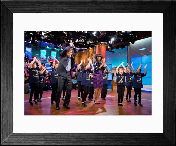 Framed Print : First Lady Michelle Obama and Dr. Mehmet Oz with the Terence C. Reilly School No. 7 dance group. They were taping the Dr. Oz Show on Feb. 22, 2013 (BSLOC_2015_3_122) Framed Print : First Lady Michelle Obama and Dr. Mehmet Oz with the Terence C. Reilly School No. 7 dance group. They were taping the Dr. Oz Show on Feb. 22, 2013 (BSLOC_2015_3_122)