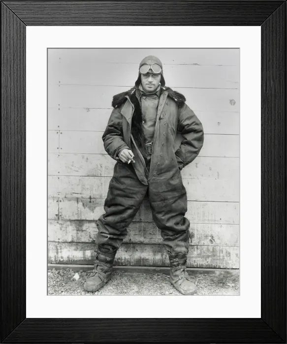 Framed Print : Pilot William C. Hopson, U.S. Air Mail Service in winter flying clothing, 1926. He wears an oversize fur-lined outer leather jumpsuit with double button front closure Framed Print : Pilot William C. Hopson, U.S. Air Mail Service in winter flying clothing, 1926. He wears an oversize fur-lined outer leather jumpsuit with double button front closure