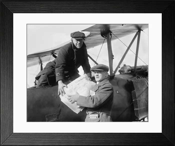 Framed Print : New York Times is loaded into an Air Mail Service plane in 1921 (BSLOC_2016_10_157) Framed Print : New York Times is loaded into an Air Mail Service plane in 1921 (BSLOC_2016_10_157)