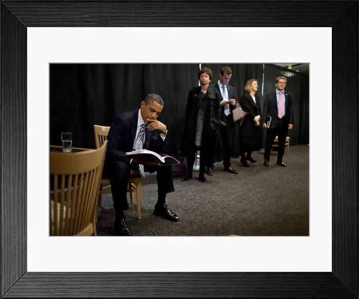Framed Print : President Barack Obama reviews notes as his staff waits before an event in Denver, Colorado. Oct. 25, 2011. L-R: The President, Valerie Jarret, unidentified, Nick Pappas, Asst Framed Print : President Barack Obama reviews notes as his staff waits before an event in Denver, Colorado. Oct. 25, 2011. L-R: The President, Valerie Jarret, unidentified, Nick Pappas, Asst