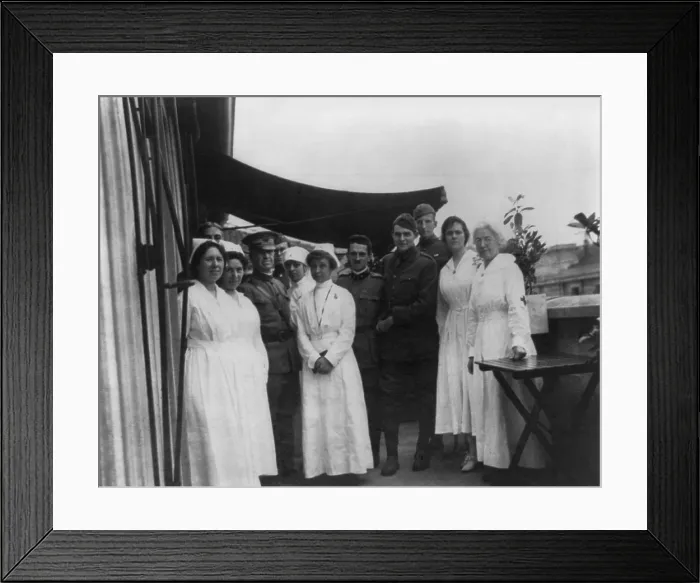 Framed Print : Ernest Hemingway, 4th from right, with soldiers and nurses at American Red Cross hospital in Milan