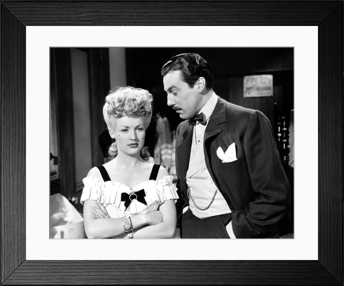 Framed Print : CONEY ISLAND, from left, Betty Grable, Cesar Romero, 1943, TM & copyright 20th Century Fox Film Corp. All rights reserved / courtesy Everett Collection