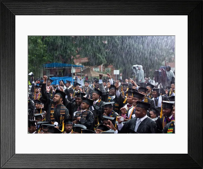 Framed Print : Morehouse College graduates cheer President Barack Obama (off camera) at their commencement ceremony. Atlanta, Ga. May 19, 2013, during pouring rain. (BSLOC_2015_3_80)