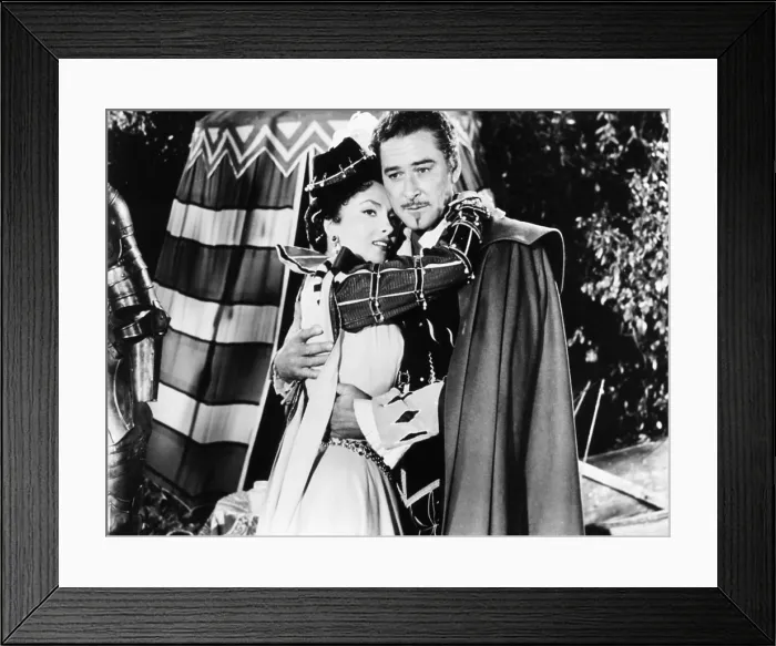 Framed Print : CROSSED SWORDS, (aka IL MAESTRO DI DON GIOVANNI), from left: Gina Lollobrigida, Errol Flynn, 1954