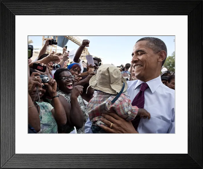 Framed Print : President Barack Obama holds a baby after delivering speaking in Cincinnati, Ohio. Sept. 22, 2011. (BSLOC_2015_3_88)