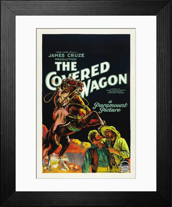 Framed Print : THE COVERED WAGON, background, left: Lois Wilson on horse; foreground bottom, left to right: Alan Hale Sr. Ernest Torrence; style A poster, 1923 Framed Print : THE COVERED WAGON, background, left: Lois Wilson on horse; foreground bottom, left to right: Alan Hale Sr. Ernest Torrence; style A poster, 1923