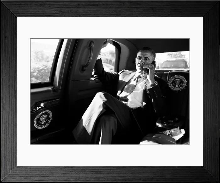 Framed Print : President Barack Obama in a conference call with advisors to discuss the Aurora, Colorado shootings. July 20, 2012 Framed Print : President Barack Obama in a conference call with advisors to discuss the Aurora, Colorado shootings. July 20, 2012