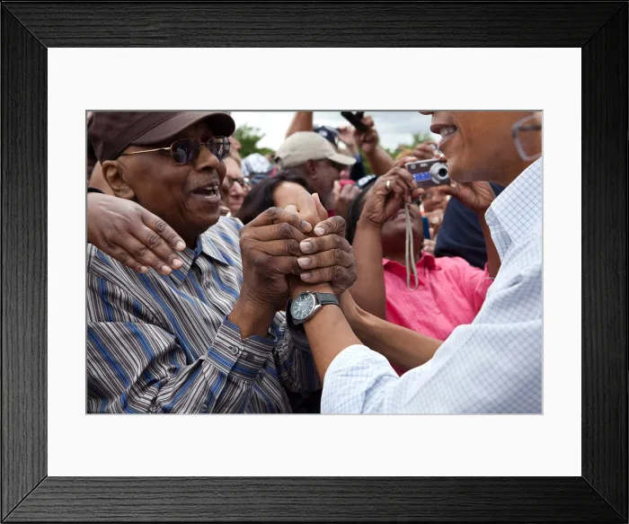 Framed Print : President Barack Obama with greets a man in Detroit during a Labor Day celebration. Sept. 5, 2011 (BSLOC_2015_3_86)
