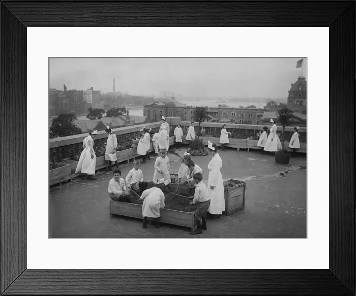 Framed Print : Children's roof garden at Ellis Island offered relief from boredom for young detainees, c.1910s. They were held back from U.S. entry because a parent was quarantined