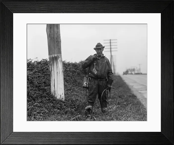 Framed Print : Chesapeake and Potomac Telephone Company lineman with his equipment in 1929 (BSLOC_2016_10_39)