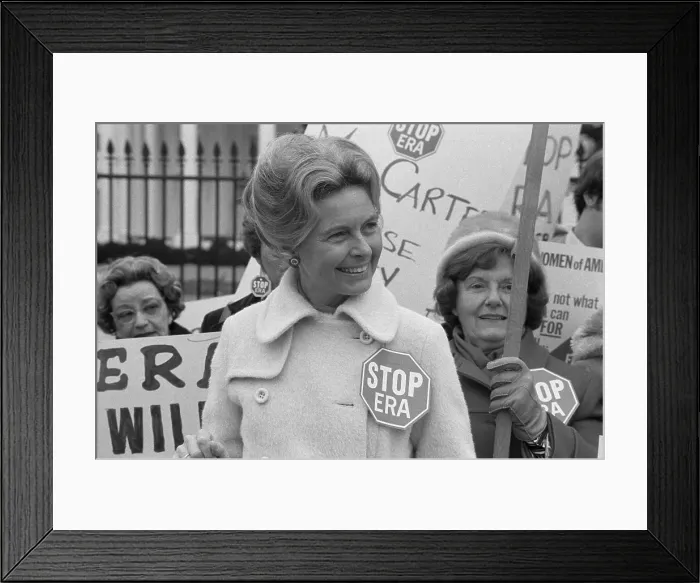 Framed Print : Conservative activist Phyllis Schlafly wearing a Stop ERA badge demonstrating with other women against the Equal Ri ghts Amendment in front of the White House