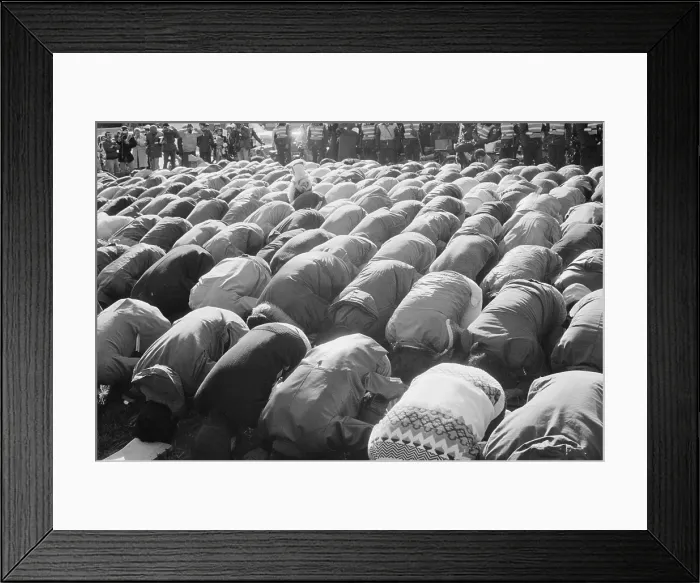 Framed Print : Iranian men kneeling in prayer at an demonstration during the Iran Hostage Crisis in Washington D.C. Nov. 30 1979 Framed Print : Iranian men kneeling in prayer at an demonstration during the Iran Hostage Crisis in Washington D.C. Nov. 30 1979