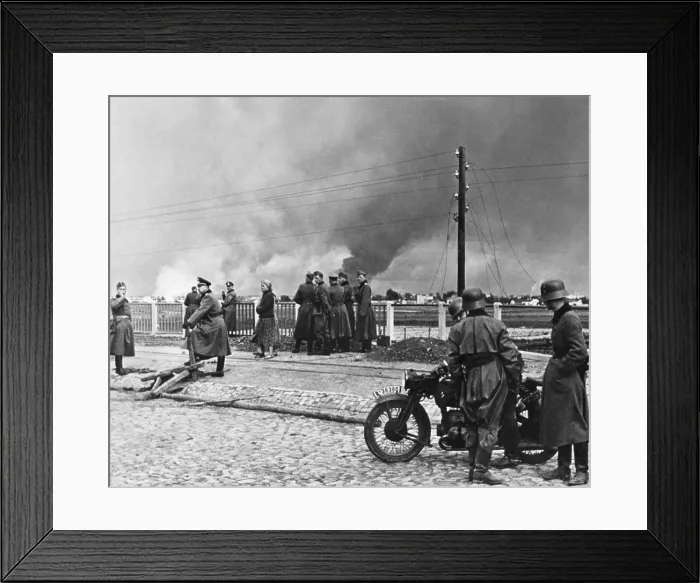 Framed Print : Poland's Capital Warsaw under bombing by the German Luftwaffe, ca. Sept. 8-15, 1939. German troops in foreground reached the suburbs of Warsaw on Sept. 8 and by the Sept