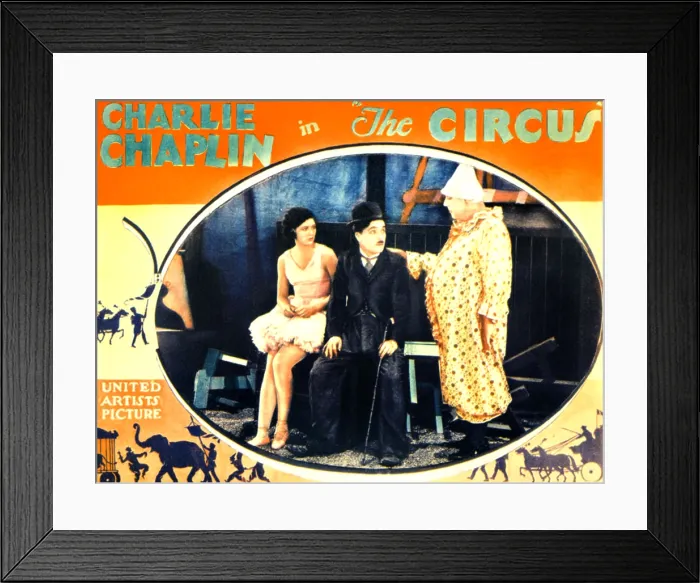 Framed Print : THE CIRCUS, l-r: Merna Kennedy, Charlie Chaplin, Henry Bergman on lobbycard, 1928