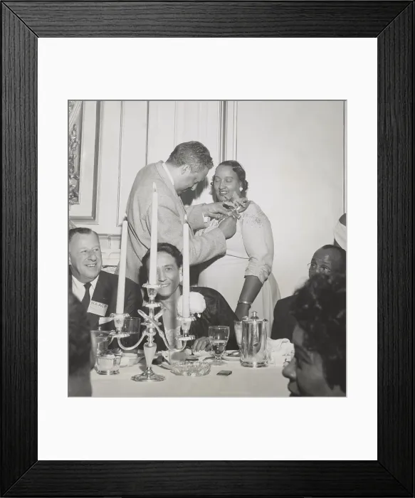Framed Print : Thurgood Marshall pins orchid on Mrs. Lulu White, at Freedom Fund Dinner, June 28, 1956. He was attending the 47th annual NAACP Convention in San Francisco. Mrs
