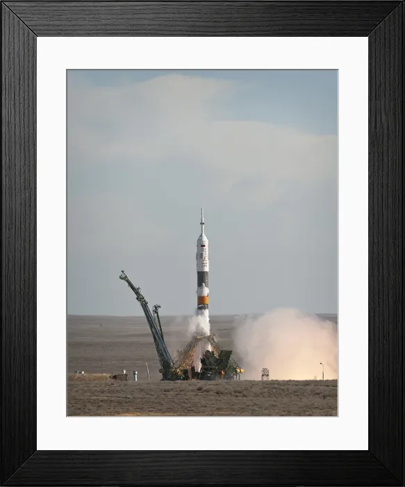 Framed Print : The Soyuz TMA-18 rocket launches from the Baikonur Cosmodrome in Kazakhstan. It carried an international crew of the Expedition 30 to the International Space Station on Apr