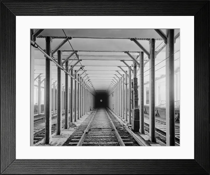 Framed Print : The New York City subway tracks at a station with a dark tunnel in the distance. 1904 LC-D4-17296