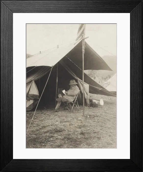 Framed Print : Theodore Roosevelt reading in front of his tent in hunting camp, June 3-4, 1909 Framed Print : Theodore Roosevelt reading in front of his tent in hunting camp, June 3-4, 1909