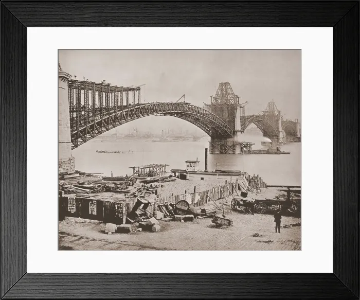 Framed Print : St. Louis Bridge under construction ca. 1870. The steel arches were cantilevered from opposing piers high above the river