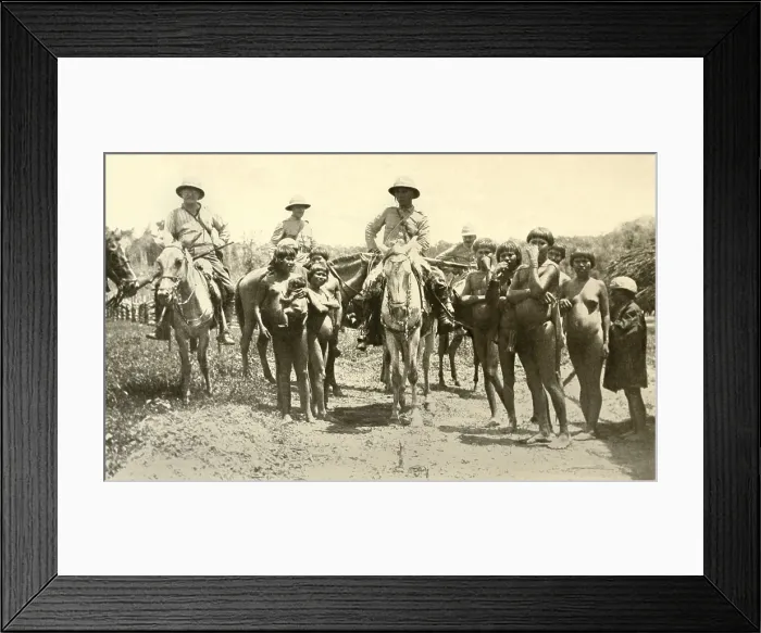Framed Print : Roosevelt-Rondon Expedition encounters friendly Nhambiquara Indians on the plateau. Colonel Candido Rondon, at center, was the first director of Brazils Indian Protection Bureau Framed Print : Roosevelt-Rondon Expedition encounters friendly Nhambiquara Indians on the plateau. Colonel Candido Rondon, at center, was the first director of Brazils Indian Protection Bureau