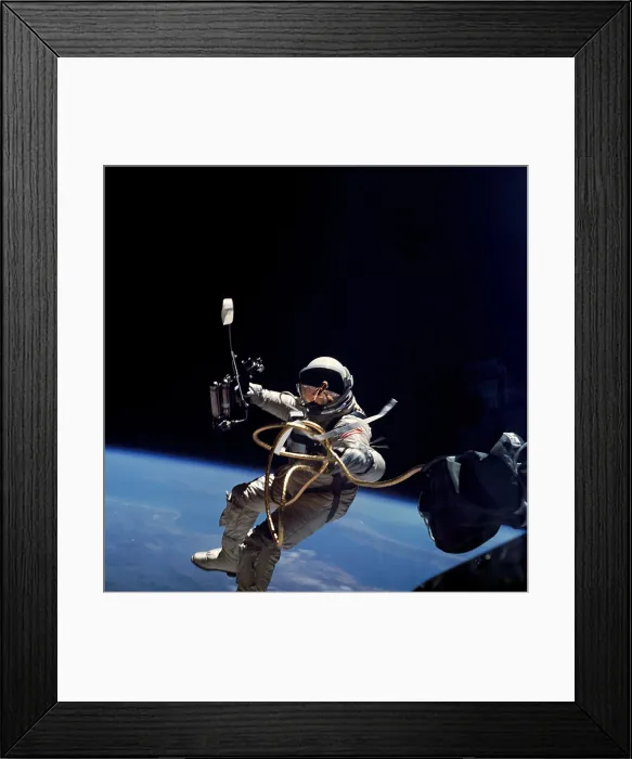 Framed Print : Astronaut Edward White floating weightless during the first US spacewalk. June 3, 1965 Framed Print : Astronaut Edward White floating weightless during the first US spacewalk. June 3, 1965