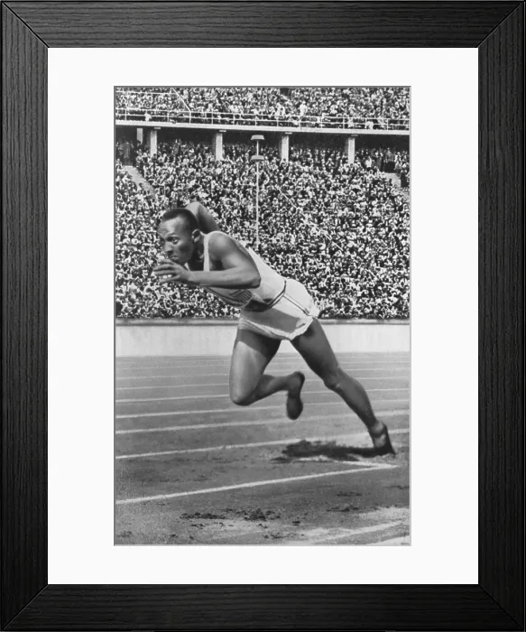 Framed Print : Jesse Owens at start of record breaking 200 meter race at the Berlin Olympics, August 4-5, 1936 (BSLOC_2017_2_191)