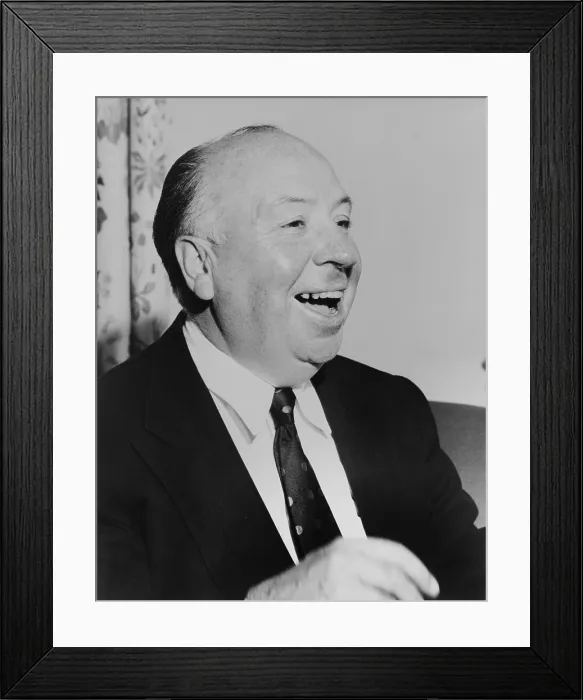 Framed Print : Film director Alfred Hitchcock laughing, 1956. (BSLOC_2015_14_170)