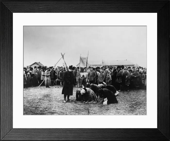 Framed Print : American Relief Administration distributing food in the Volga District, 1921. Russian women abjectly kneel nearby (BSLOC_2017_2_26)