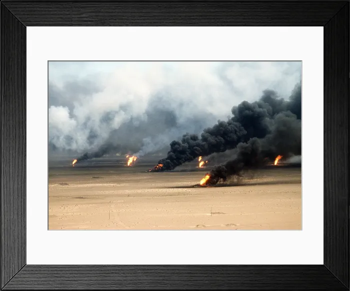 Framed Print : Oil well fires rage outside Kuwait City in the aftermath of the First Gulf War. Retreating Iraqi troops set fire to Kuwait's oil fields. Mar. 21 1991. (BSLOC_2011_3_14)