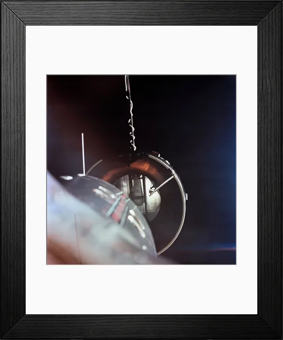 Framed Print : Gemini 8 spacecraft approaching the Agena Target Docking vehicle. The mission conducted the first docking of two spacecraft in orbit. March 16, 1966 Framed Print : Gemini 8 spacecraft approaching the Agena Target Docking vehicle. The mission conducted the first docking of two spacecraft in orbit. March 16, 1966