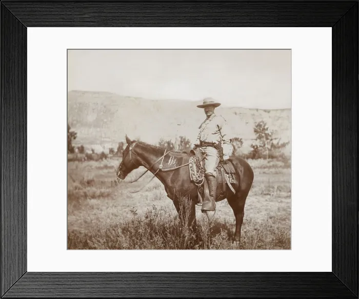 Framed Print : Young Theodore Roosevelt on his favorite hunting pony in the Badlands of North Dakota, 1885. He is wearing a ranch costume during a cattle roundup near Medora, North Dakota Framed Print : Young Theodore Roosevelt on his favorite hunting pony in the Badlands of North Dakota, 1885. He is wearing a ranch costume during a cattle roundup near Medora, North Dakota