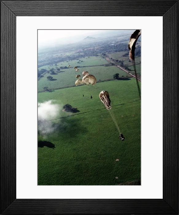 Framed Print : U.S. Soldiers of 1st Battalion 509th Infantry parachute from into a drop zone outside the Panama City during the U.S. invasion of Panama. Dec. 1989. (BSLOC_2011_3_22)