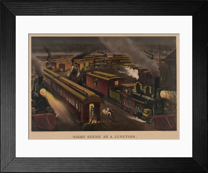 Framed Print : Railroad junction in 1885. Passenger and freight trains arriving and leaving an American multi-track train station at night Framed Print : Railroad junction in 1885. Passenger and freight trains arriving and leaving an American multi-track train station at night