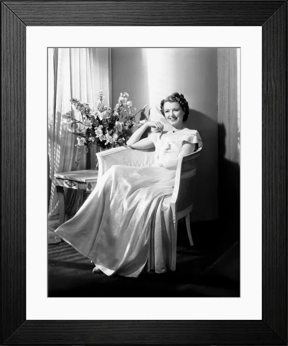 Framed Print : A STAR IS BORN, Janet Gaynor, in a gown by Omar Kiam, 1937