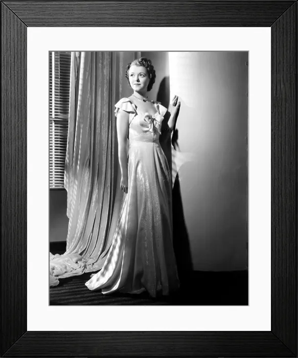 Framed Print : A STAR IS BORN, Janet Gaynor, in a gown by Omar Kiam, 1937