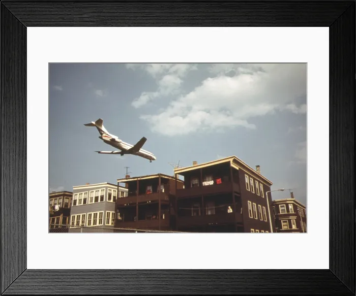 Framed Print : Jet Liner coming in for landing at Logan Airport in East Boston. June 1973
