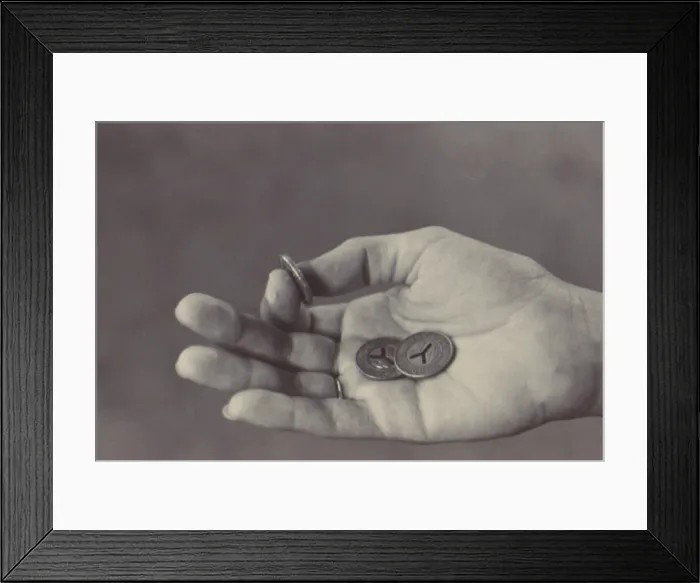 Framed Print : New York City Subway. Three 35-cent Tokens were the currency of the New York's 232 mile Subway system in the 1970s. May 1973