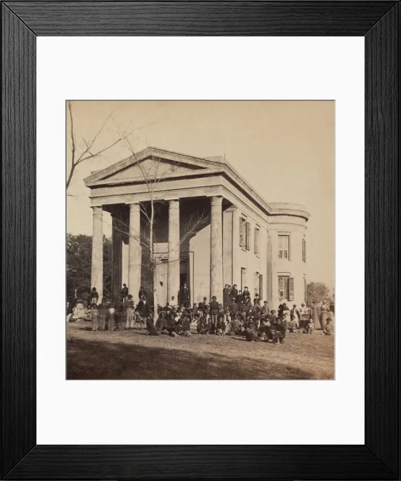 Framed Print : Freedmen and teachers in front of the Beaufort Library, South Carolina, 1862. Young African American children, and possibly the soldiers, are students