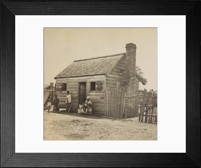 Framed Print : African American Uncle July and his family in front of their home on the Fripp plantation, St. Helena Island, SC, 1863-66 Framed Print : African American Uncle July and his family in front of their home on the Fripp plantation, St. Helena Island, SC, 1863-66