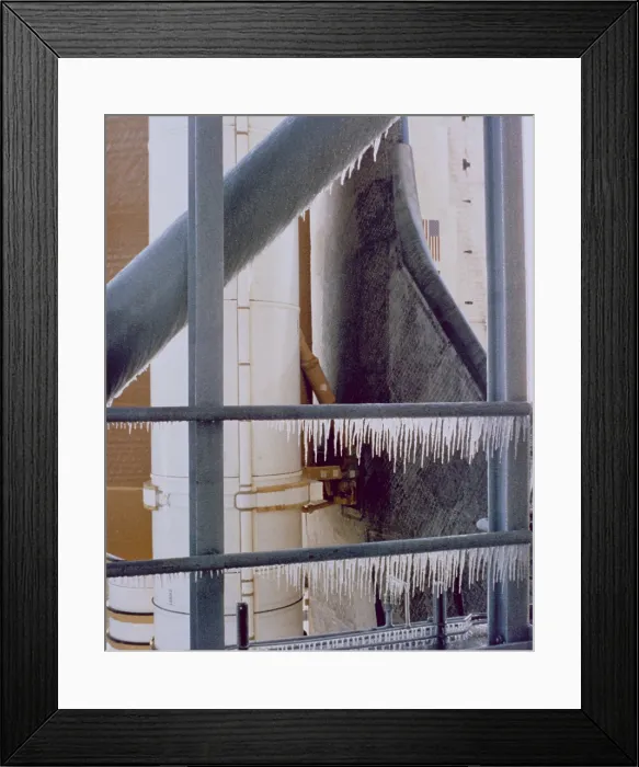 Framed Print : Space shuttle Challenger disaster. Icicles at the launch in the early morning hours on January 28, 1986
