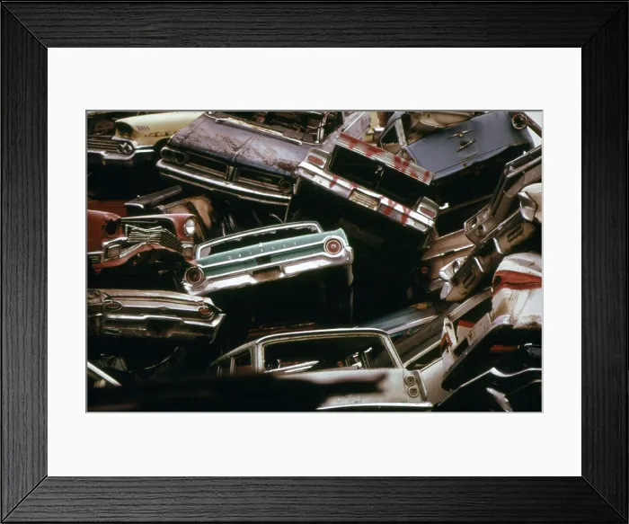 Framed Print : American cars crushed for scrap steel to be recycled in Japanese steel mills and used in the manufacture of Toyotas and Datsun exported back to the US. Ca. 1973-75 Framed Print : American cars crushed for scrap steel to be recycled in Japanese steel mills and used in the manufacture of Toyotas and Datsun exported back to the US. Ca. 1973-75