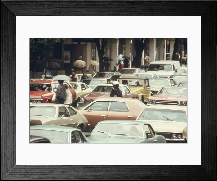 Framed Print : A Washington D.C. policeman stands among gridlocked cars during a bus strike leaving 250 000 to find alternate transportation to work. May 1974