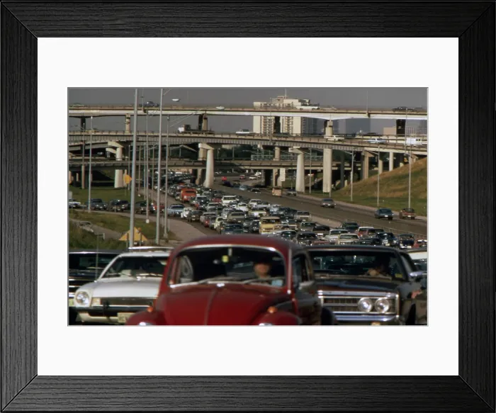 Framed Print : Traffic jam on a freeway with a multistory group of overpasses in the background. Ca. 1973-75 Framed Print : Traffic jam on a freeway with a multistory group of overpasses in the background. Ca. 1973-75