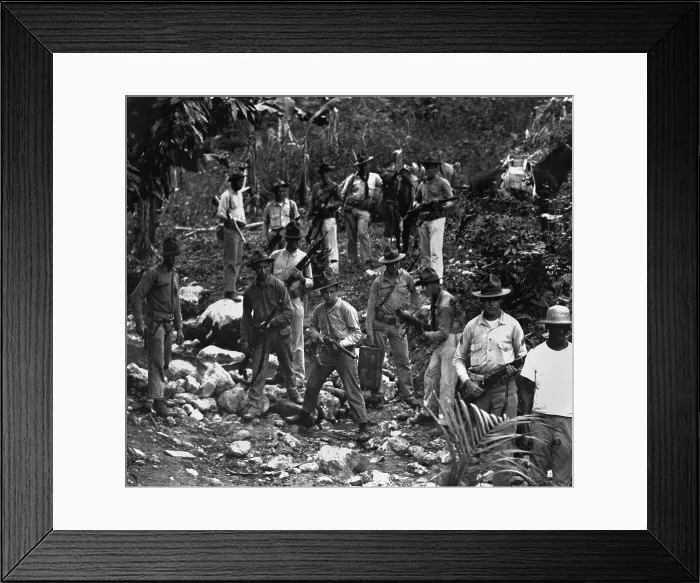 Framed Print : US Marines and a guide in search of bandits in 1919 during the US occupation of Haiti